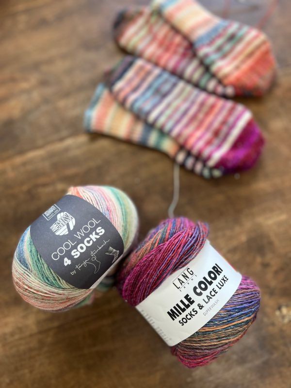 Colourful sock yarns and hand-knitted socks